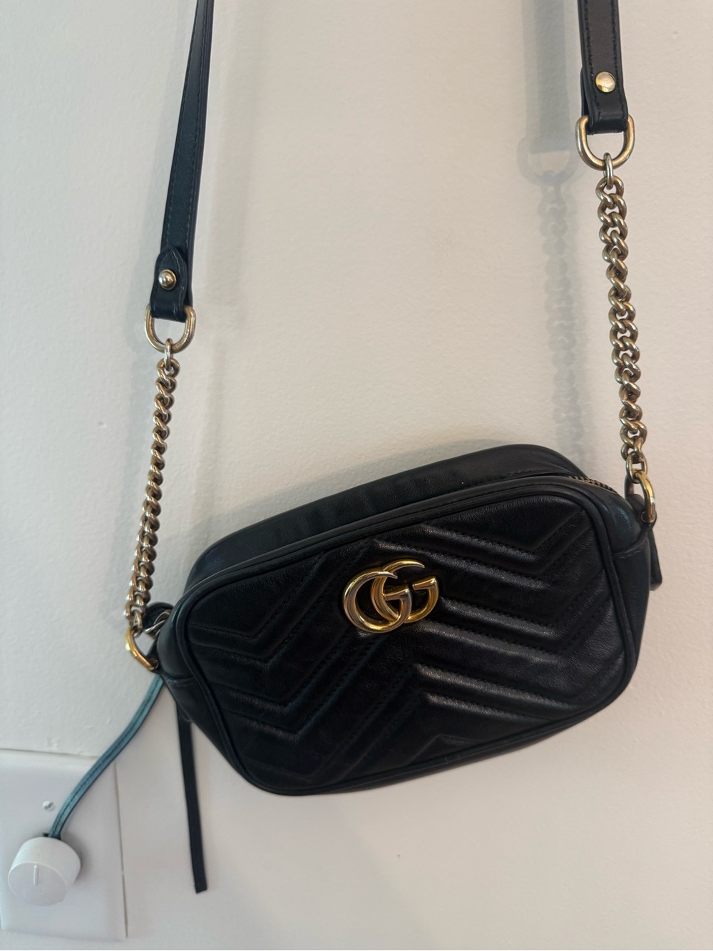 Black Quilted Crossbody Bag with Gold Logo Accent